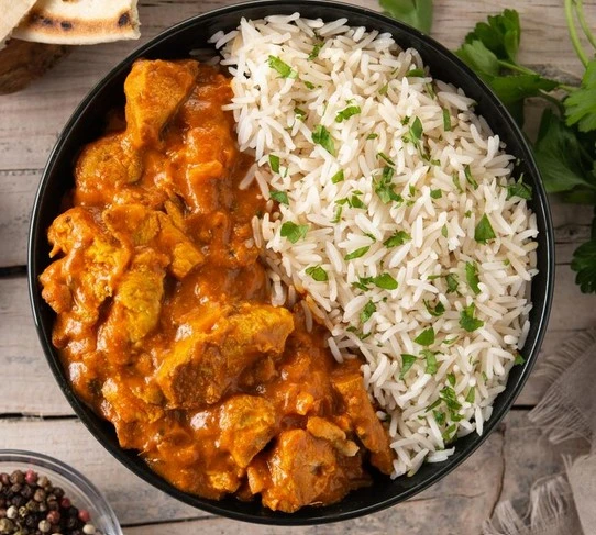 Butter Chicken Rice Combo at New Spice Darbar Sweets & Restaurant and Street Foods in Calgary, AB